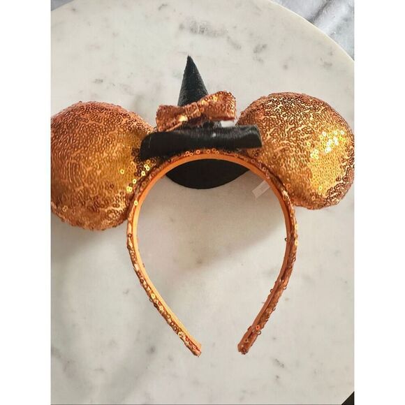 Disneys Minnie mouse orange sequin Halloween witch ears